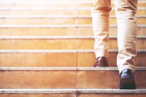 a man going up the stairs